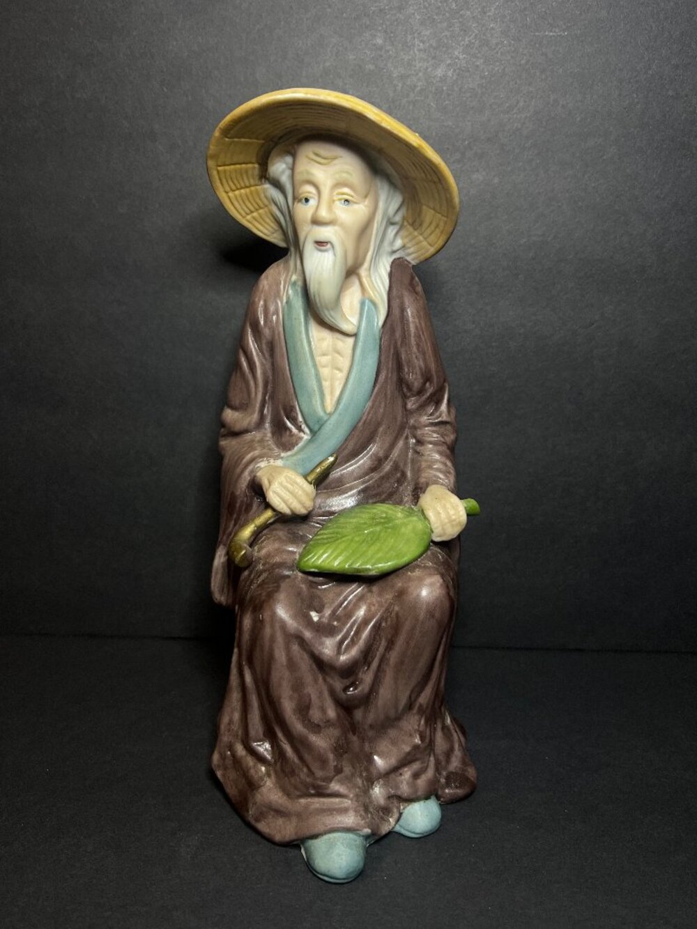 Vintage 1970s Toyo Porcelain Seated Old Asian Man Figurine w/ Palm Leaf Fan